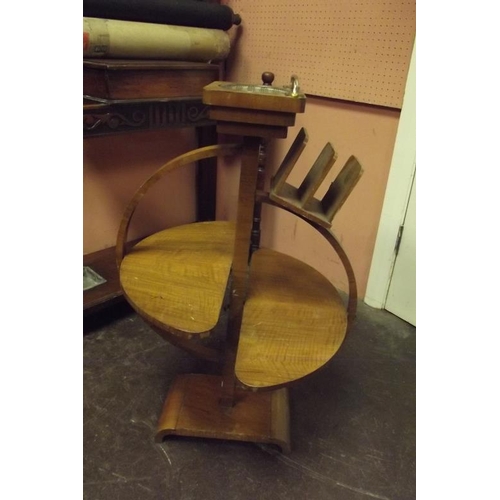 323 - Art Deco walnut veneered smoker's stand having pair of folding shelves, 30 in. high.