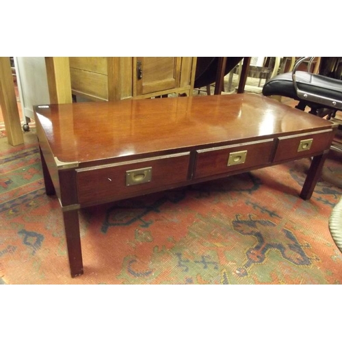 326 - Campaign style coffee table having rectangular top, brass mounts, three short drawers and three dumm... 