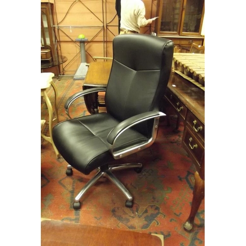 327 - Contemporary black leather chrome framed swivel office chair.