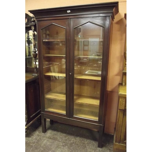 347 - Victorian mahogany bookcase, ogive cornice above pair of glazed doors and on plain supports, 75 in. ... 