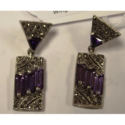 35 - Pair of amethyst, marcasite and silver Art Deco design earrings.