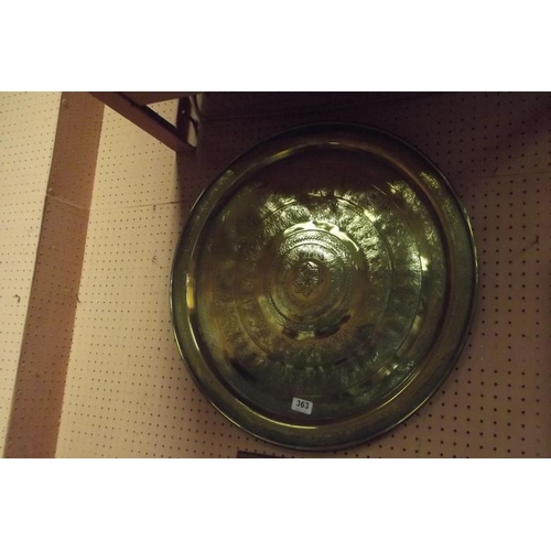 363 - Eastern circular brass wall plaque having engraved decoration.