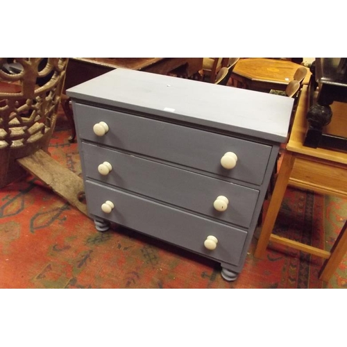 375 - Painted chest of three long drawers with ceramic handles and on turned supports, 34 in. x 35 in. x 1... 