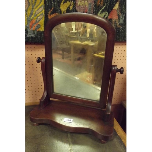 384 - 19th Century mahogany dressing-table mirror set on shaped base.