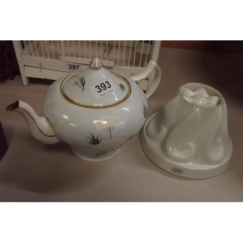 393 - Royal Grafton teapot, and a Shelley jelly mould. (2)