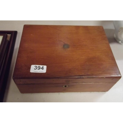 394 - Small 19th Century mahogany writing box, lift-up lid with fitted interior.