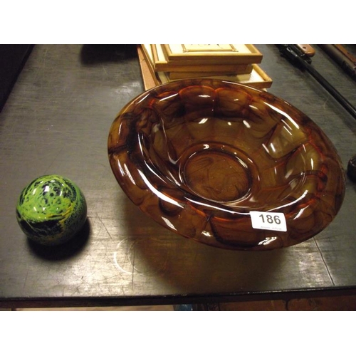 186 - Smoked glass bowl, and a Mdina glass paperweight.