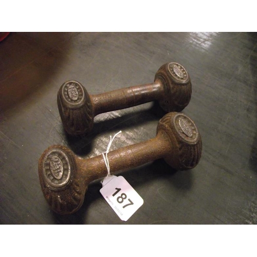 187 - Pair of vintage cast iron 2.5 lb. dumbbells.