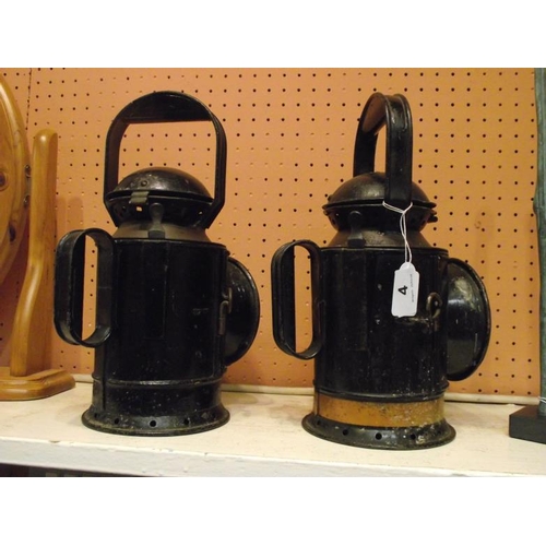 4 - Pair of vintage black painted metal railway guard's lamps, revolving inner sleeves with red, white, ... 