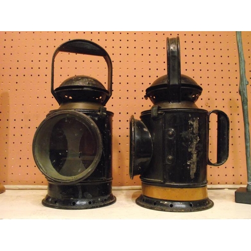 4 - Pair of vintage black painted metal railway guard's lamps, revolving inner sleeves with red, white, ... 