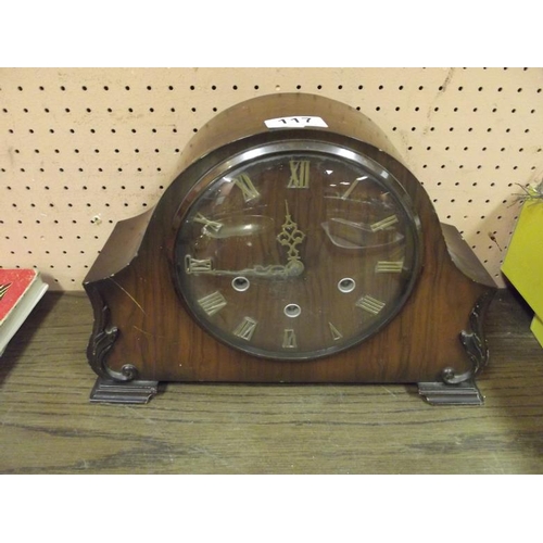 117 - Walnut cased dome top mantle clock.