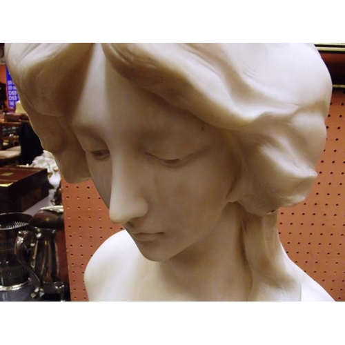 124 - Italian white marble bust of a young lady, signed Adolphyn, on green marble plinth, 24 in. high.