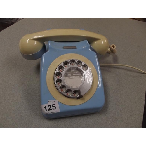 125 - Vintage light blue/cream telephone.
