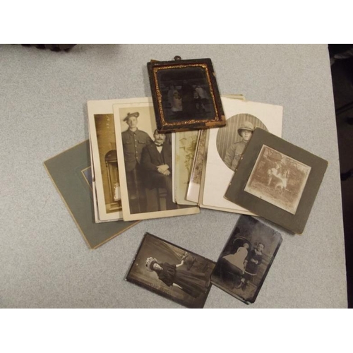 169 - Small collection of antique photographs.