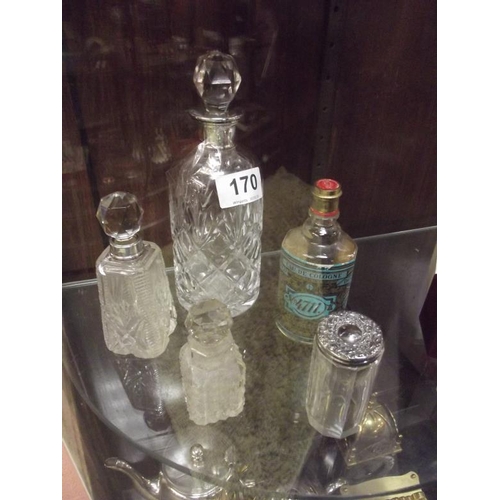 170 - Various glass scent bottles, three with silver mounts.