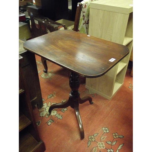 244 - Antique mahogany centre table, tilt top set on baluster column, downswept supports, 28 in. high.