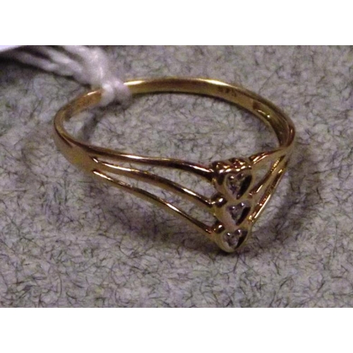 53 - 9 ct. yellow gold ring with three small diamonds in heart shaped mounts, size N, 1 g.