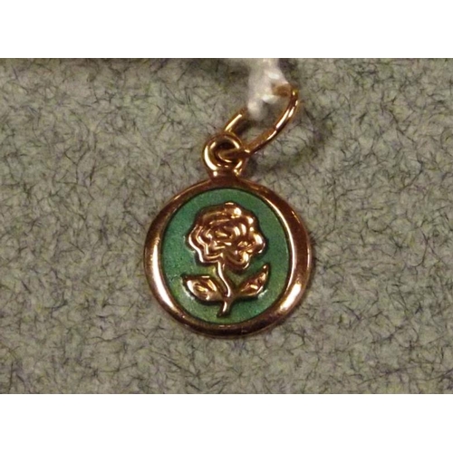 54 - Russian 14 ct. gold and enamel floral pendant, 1.2 g.