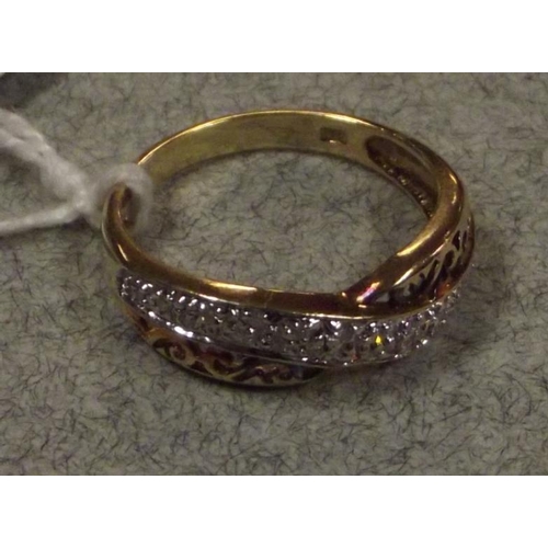 58 - 9 ct. yellow gold ring set with twelve small diamonds, size O, 2.6 g.
