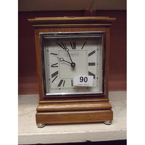 90 - Comitti oak cased mantle clock, quartz.