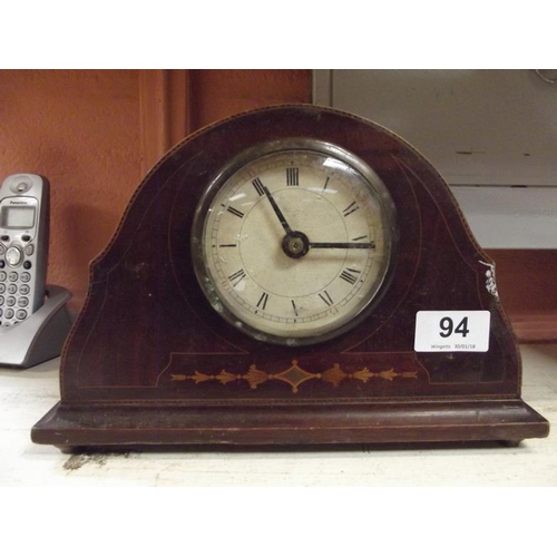 94 - Inlaid mahogany cased dome top mantle clock.