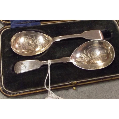 121 - Two antique silver caddy spoons, London 1830 and 1847.