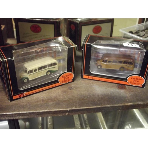 131 - Two collectable scale model buses, in boxes.