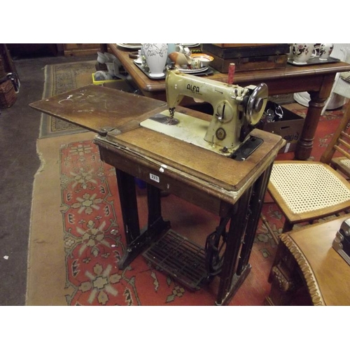 223 - Singer treadle sewing machine.