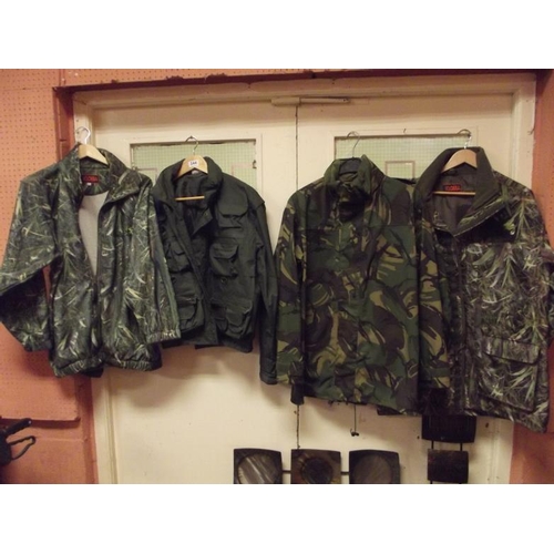 244 - Three camouflage fishing coats, and one other.