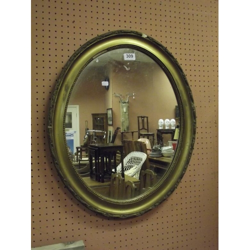 309 - Oval gilt framed wall mirror.