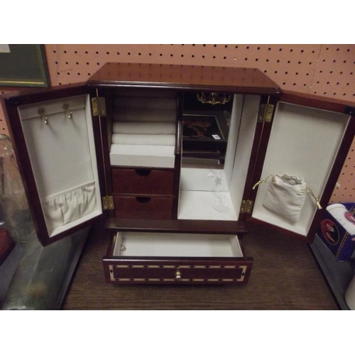 70 - Inlaid table-top two-door jewellery cabinet.