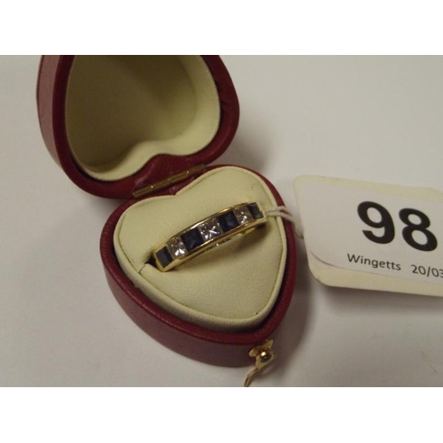 98 - 18 ct. yellow gold diamond and sapphire ring, 4.7g., size I.