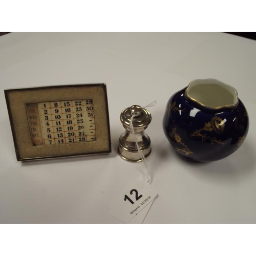 12 - Small Royal Worcester pot, small silver and shagreen framed desk calendar, and a silver pepper mill.