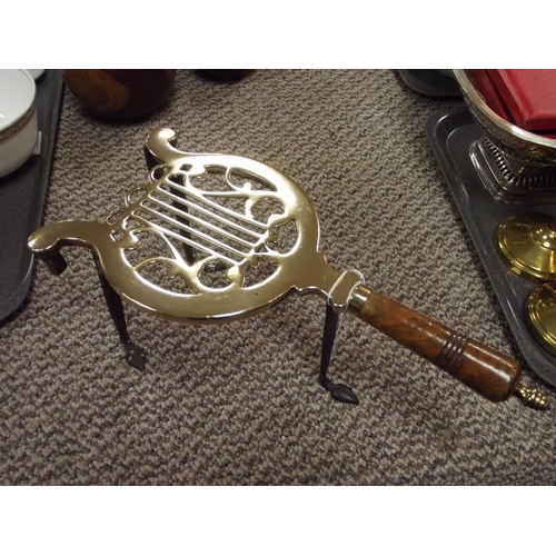 48 - Antique brass lyre form trivet with turned wood handle.