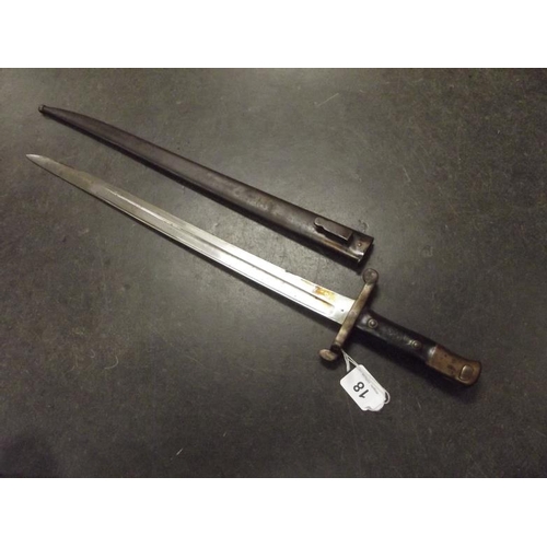 18 - Early 19th century bayonet, 18.5 in. single edged blade, in steel scabbard.