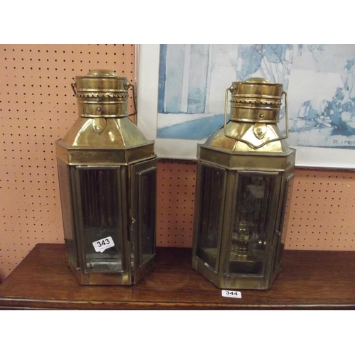 343 - Pair of antique style brass lantern form light fittings.