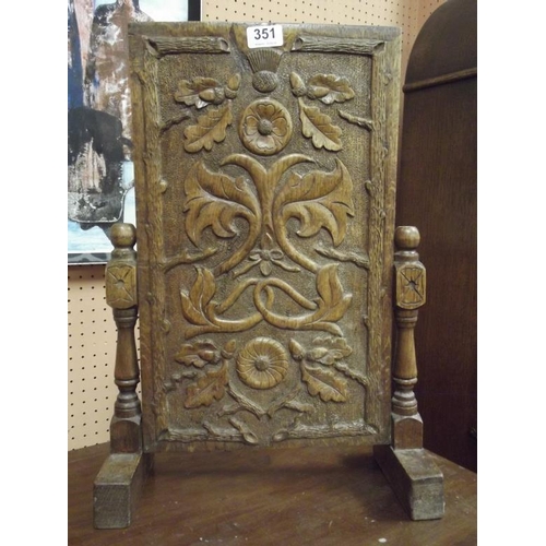 351 - Small carved oak table-top screen, 21 in. high.