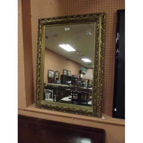 355 - Gilt framed wall mirror, 33 in. x 23 in.