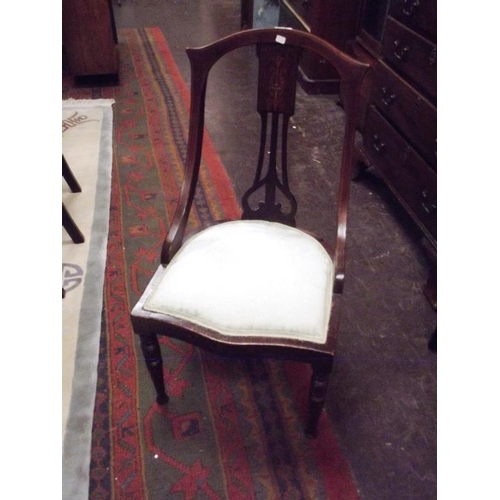 361 - Inlaid mahogany nursing chair having upholstered seat and turned frontal supports.