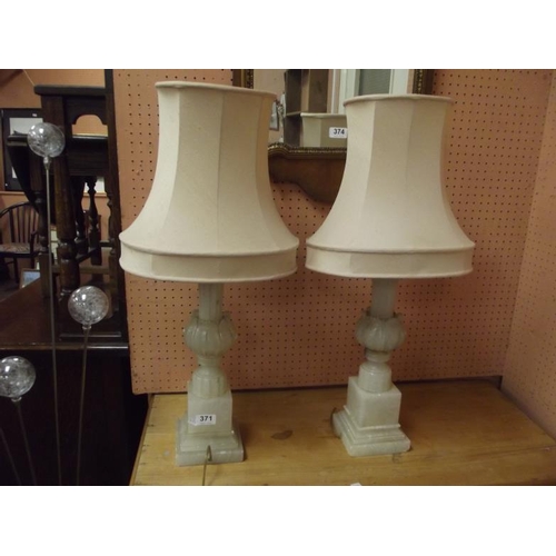 371 - Pair of alabaster table lamps and shades.