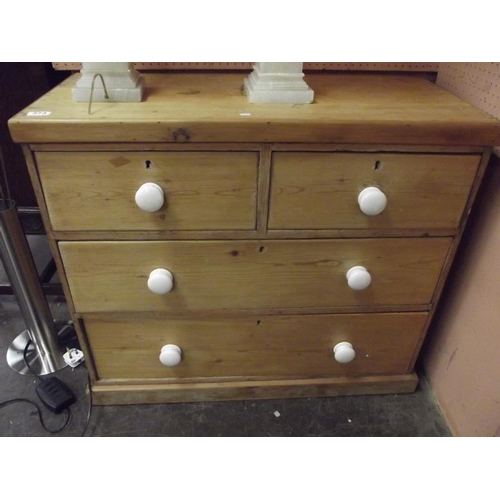 373 - Victorian pine dwarf chest having two short and two long drawers with ceramic knob handles, 31 in. x... 