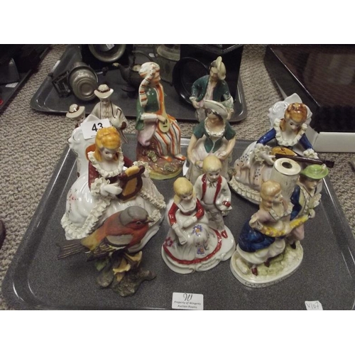 43 - Various ceramic figurines.