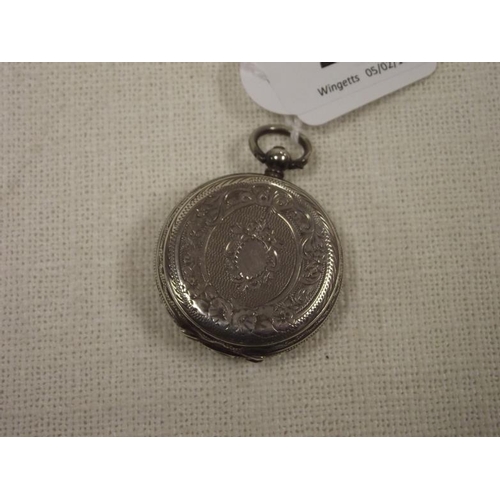 20 - Continental white metal fob watch, with subsidiary seconds dial, marked 935.