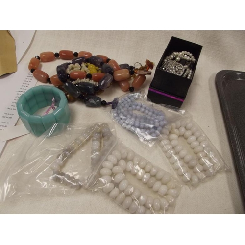 42 - Various costume jewellery, hardstone necklaces, etc.