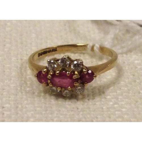 119 - 9 ct. yellow gold ring set with pink and clear stones, size L, 1.8 g.