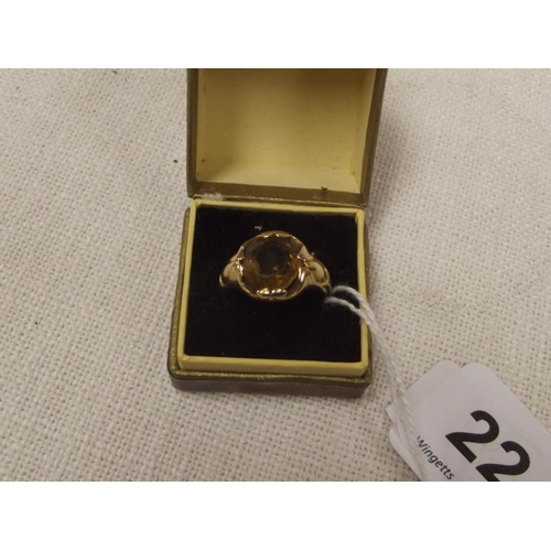 22 - 18 ct. yellow gold ring set with a clear yellow stone, size T, 9 g.