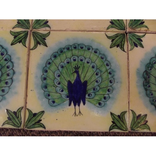 30 - Ten 6 in. ceramic tiles, handpainted peacock design.