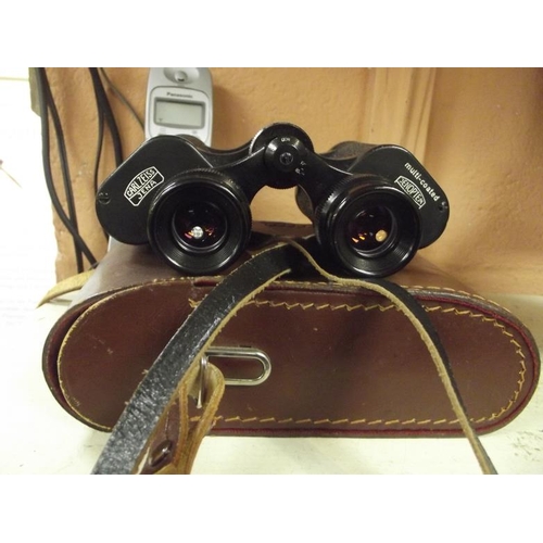 67 - Pair of Carl Zeiss Jenoptem 8 x 30 W binoculars in leather case.