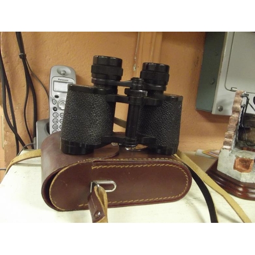 67 - Pair of Carl Zeiss Jenoptem 8 x 30 W binoculars in leather case.