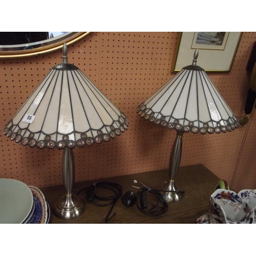 86 - Pair of modern table lamps with Tiffany style shades.